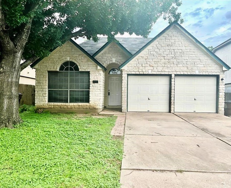 an entrance to house with yard