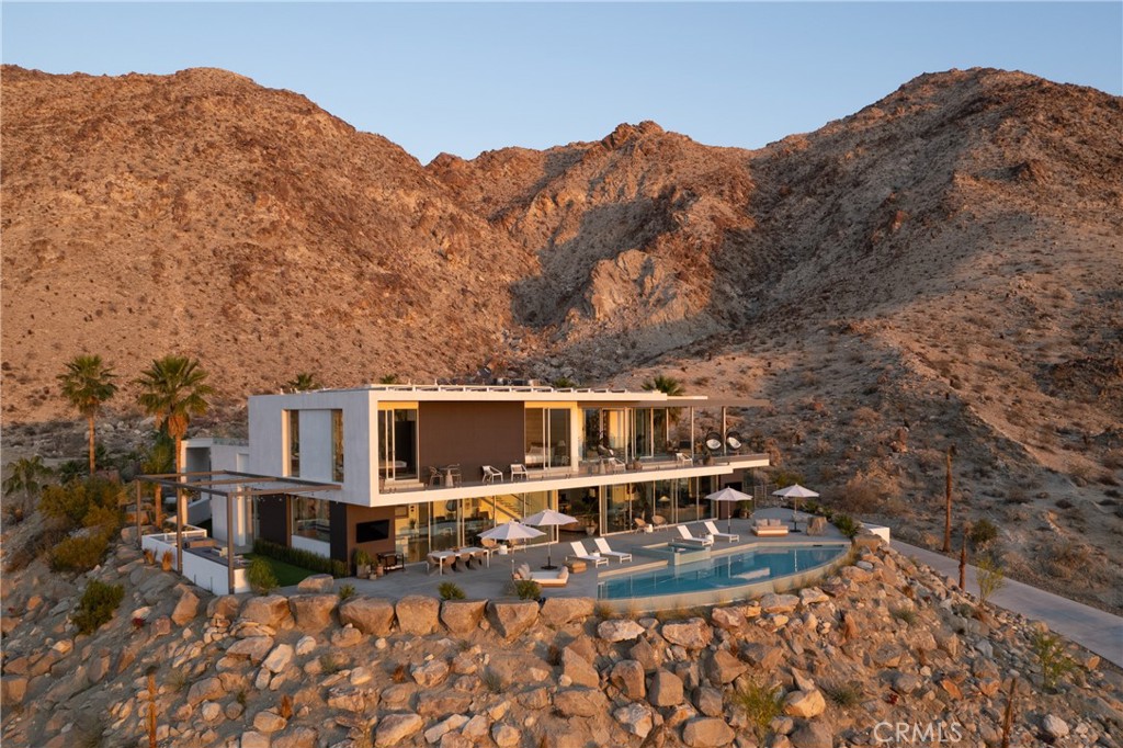 a view of a house with a mountain