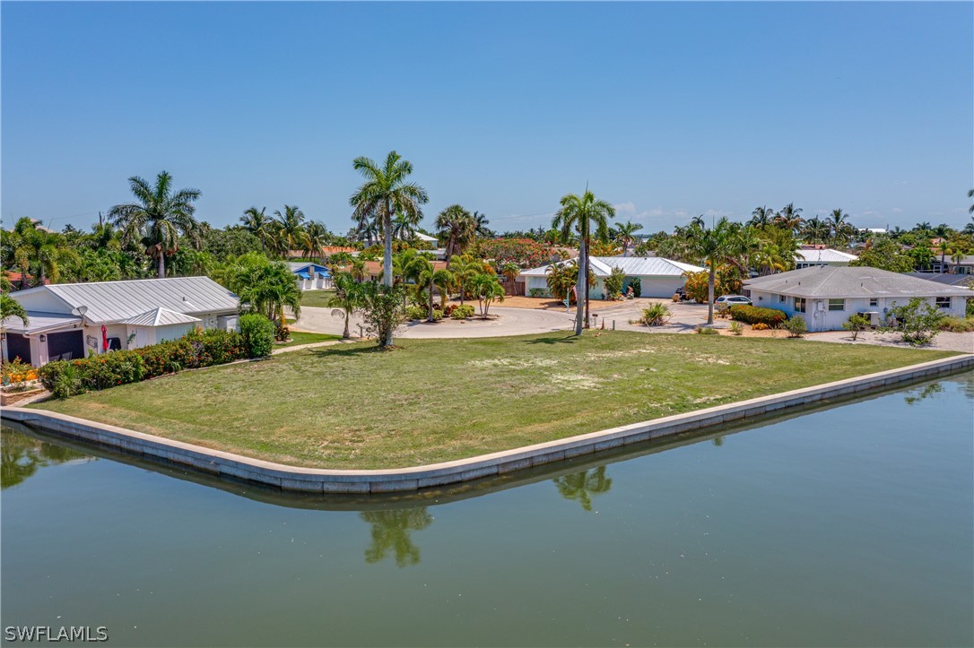 a view of a pool and an outdoor space