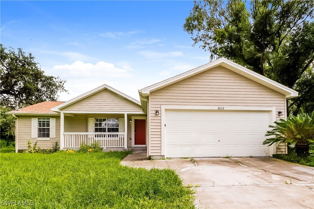 a view of front a house with a yard