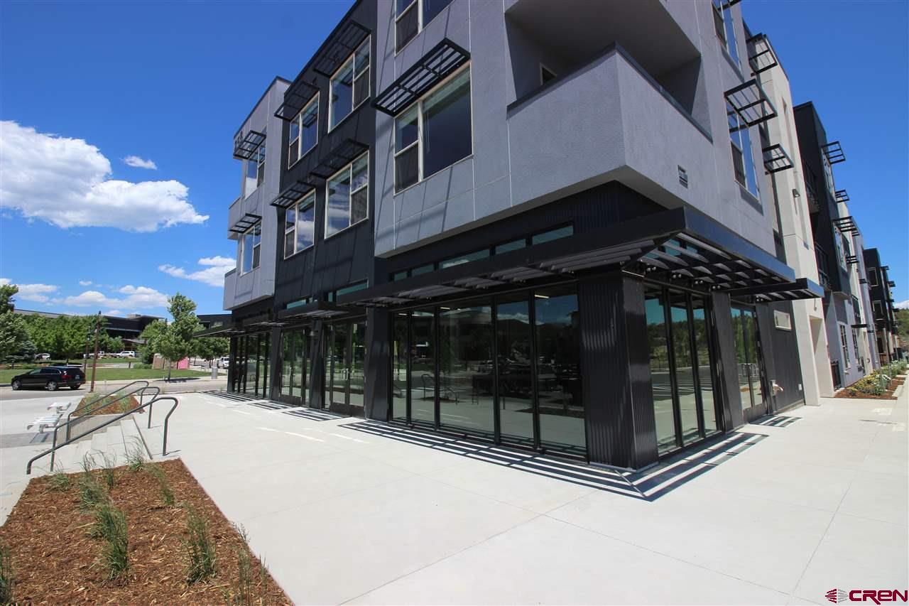 a view of a building with a glass door