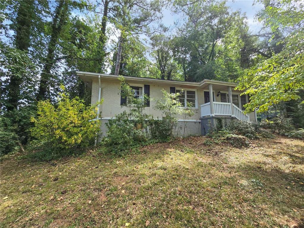 front view of a house with a yard