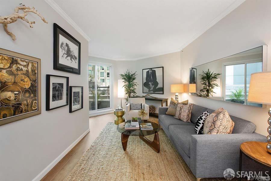 a living room with furniture or couch and a flat screen tv