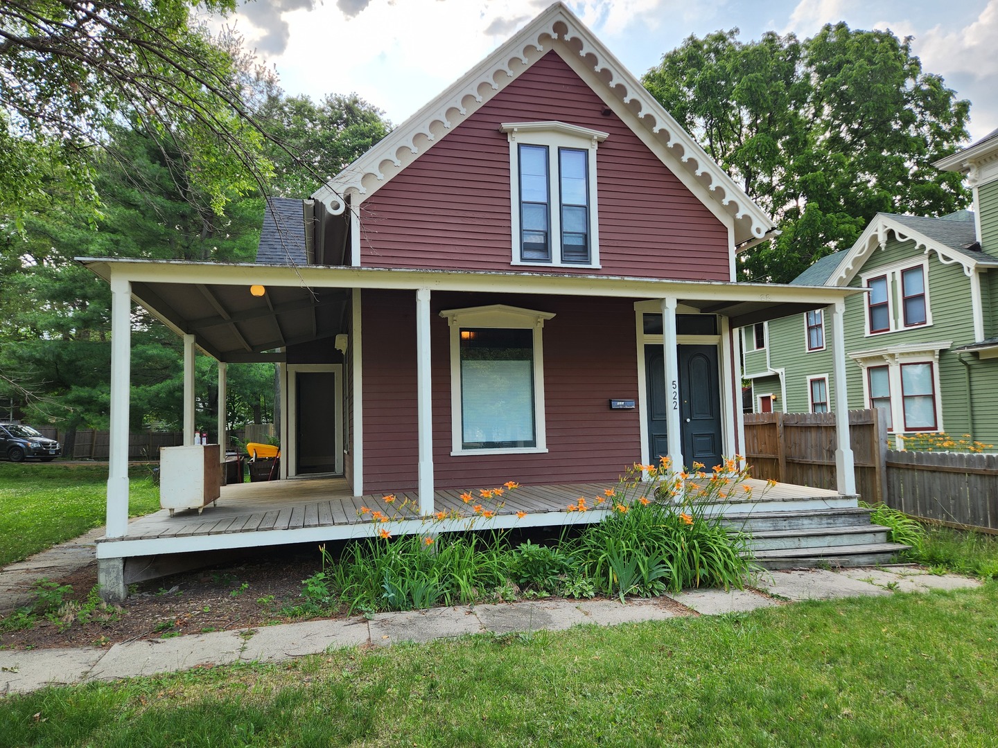 a front view of a house with garden