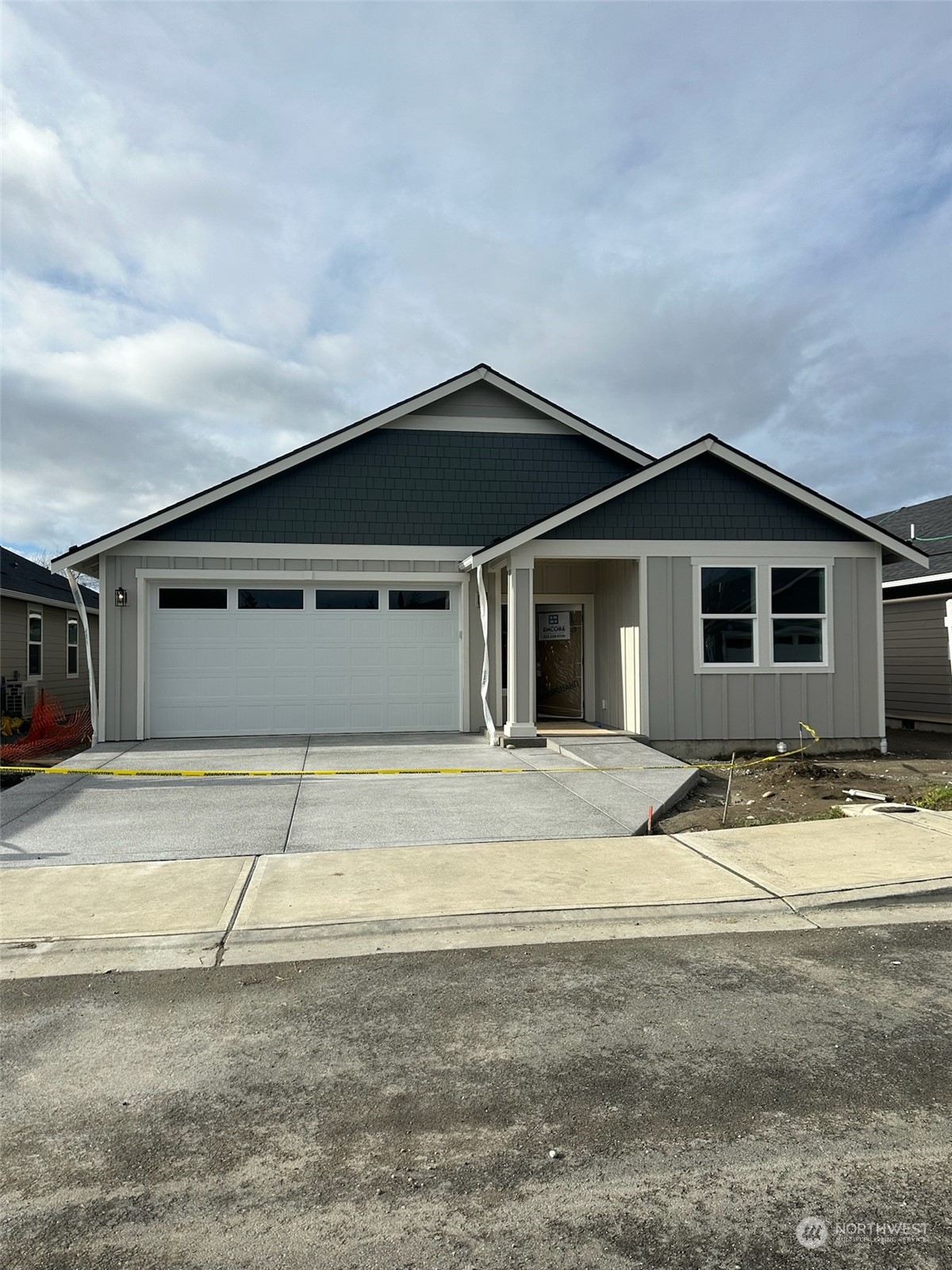 a house with yard in front of it