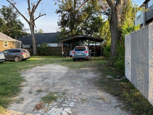 a view of car parked in front of house