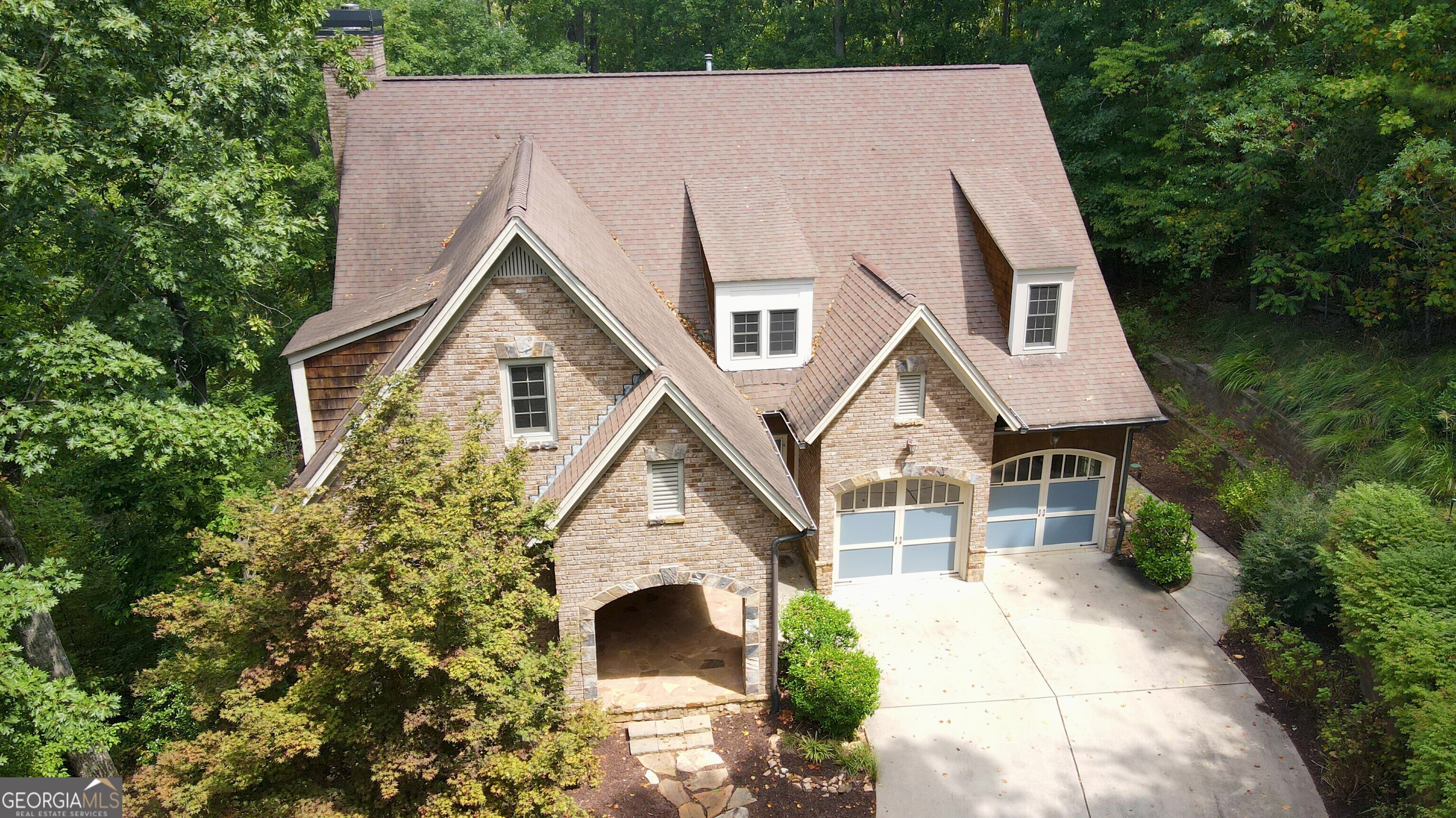 a aerial view of a house with garden