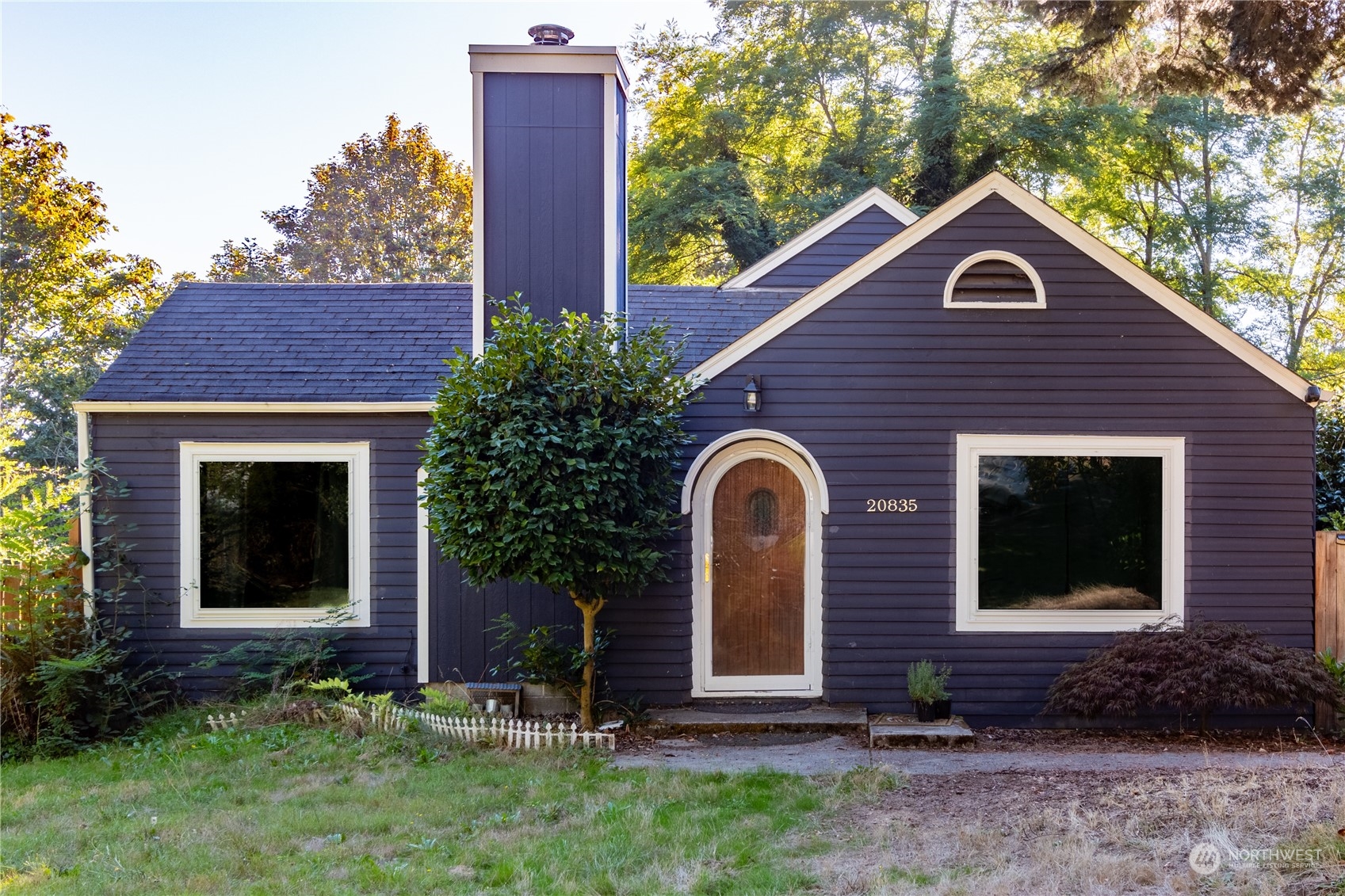 a house view with a garden space