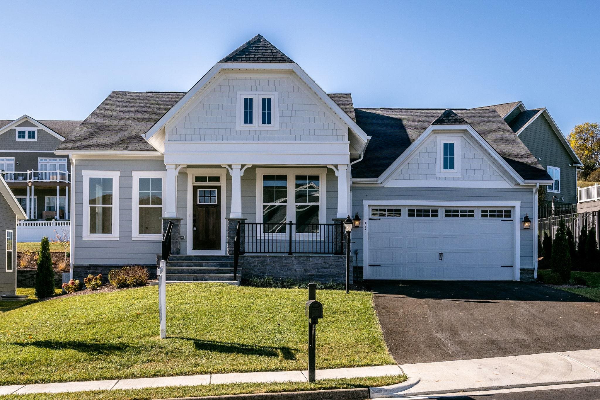 front view of a house with a yard