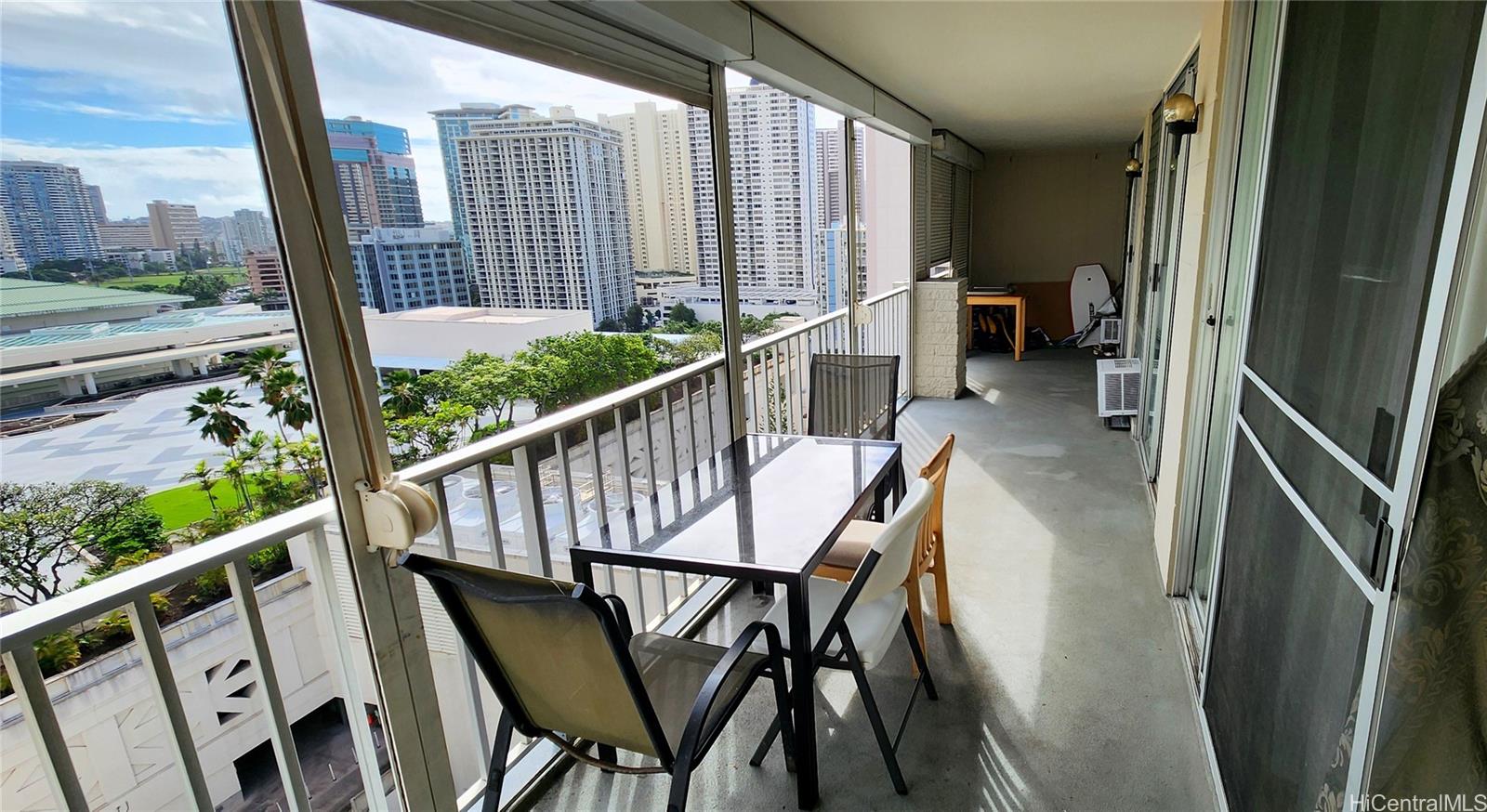 a view of balcony with furniture