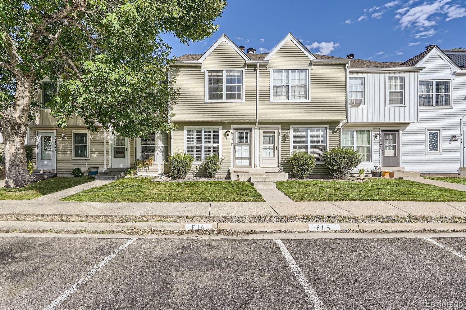 front view of house with a yard