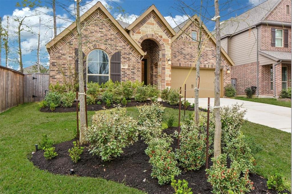 Brick/Stone Elevation & Manicured Landscaping