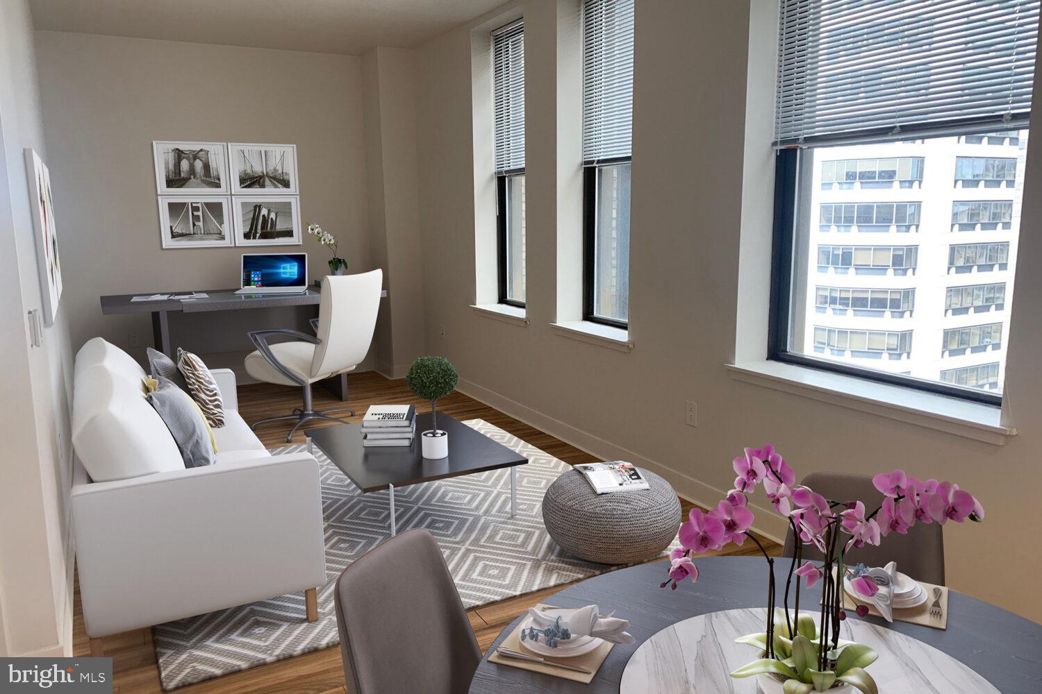 a living room with furniture and window