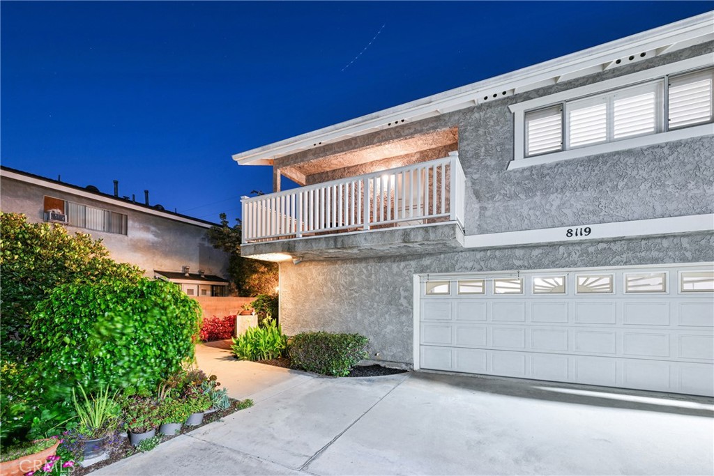 a view of a house with a garage