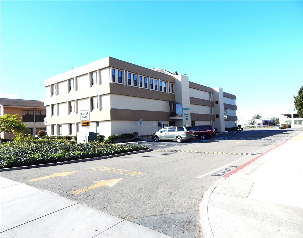 a view of a building with a street