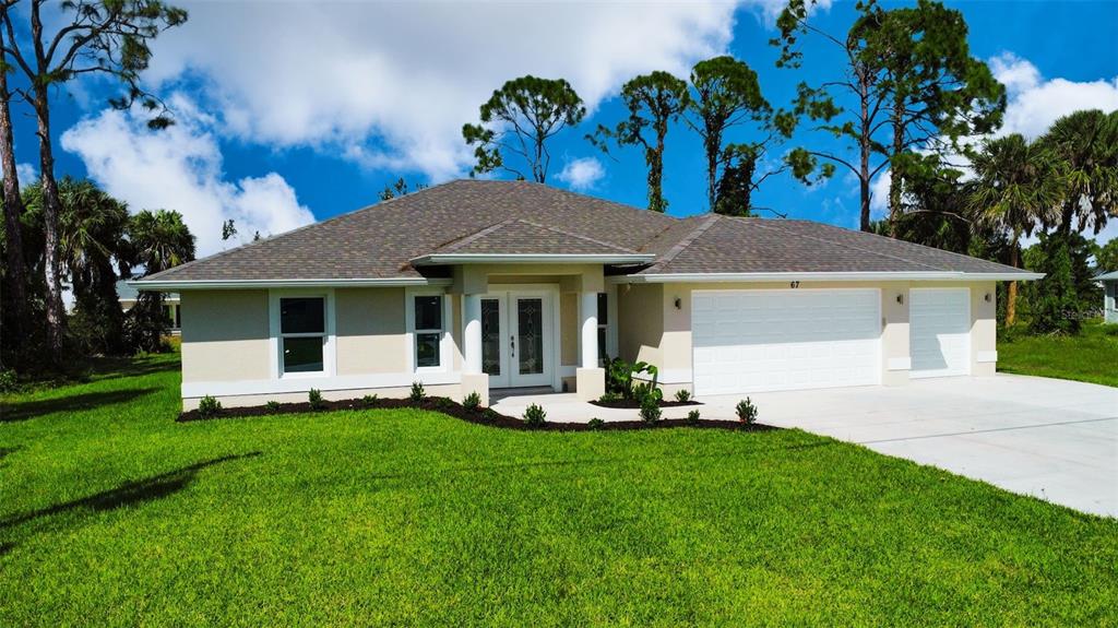 a front view of a house with a garden and porch