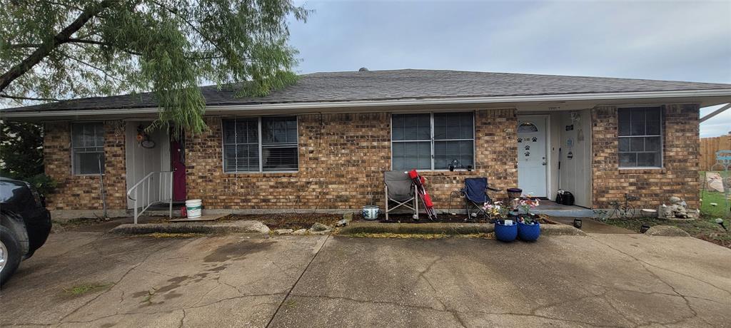 a front view of a house with a garage