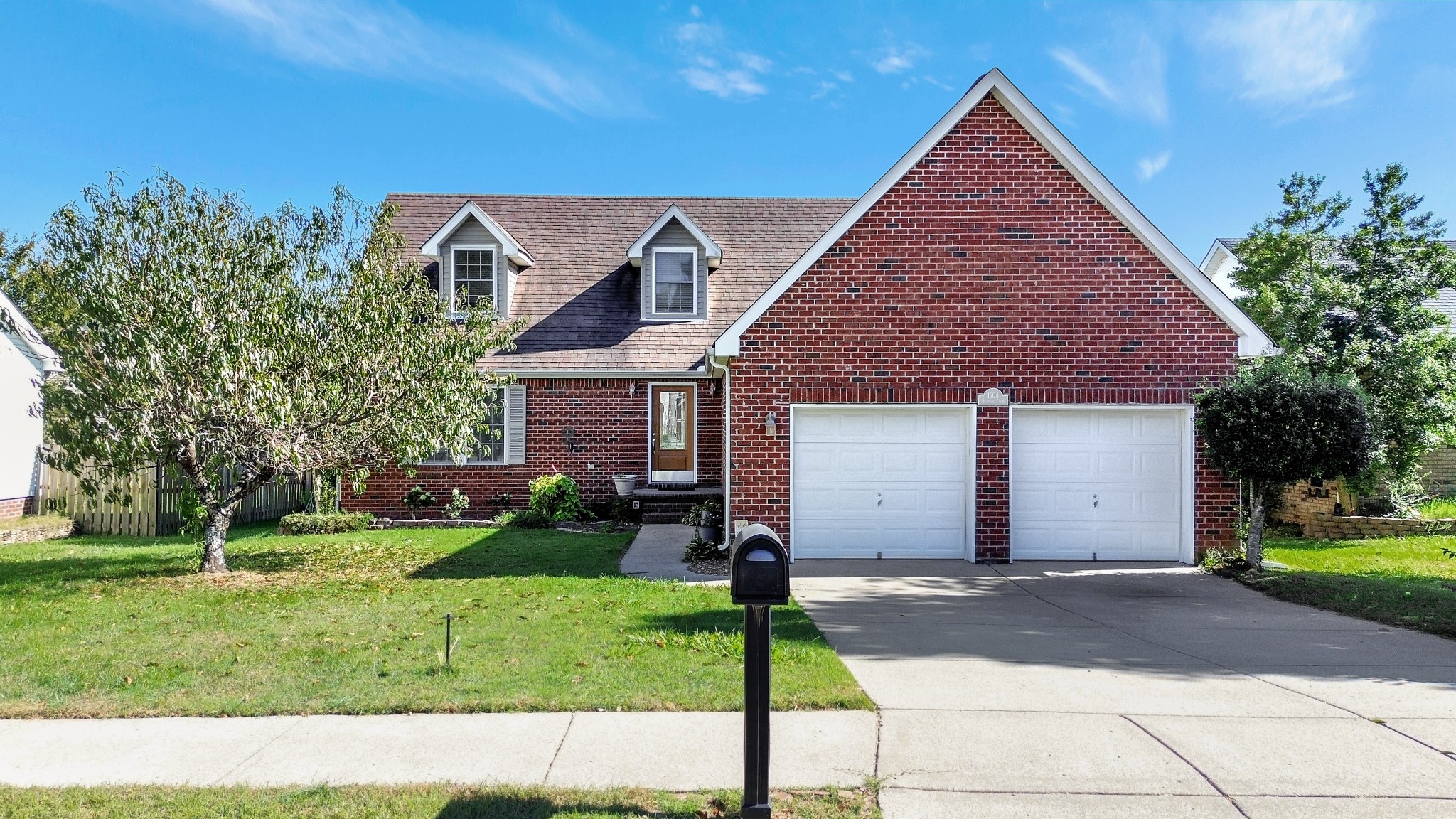 a front view of house with yard