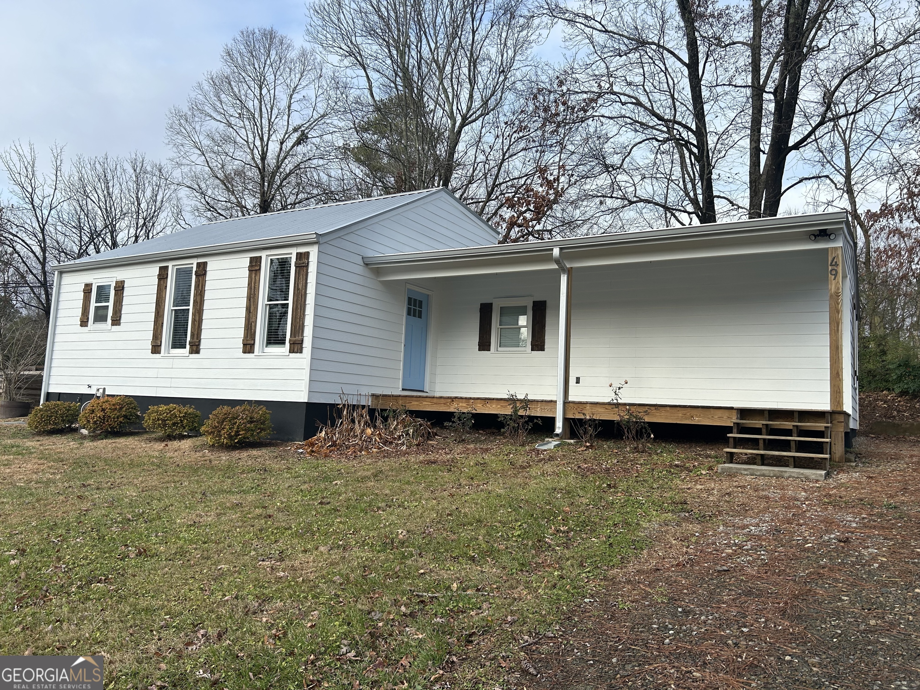 a front view of house with yard