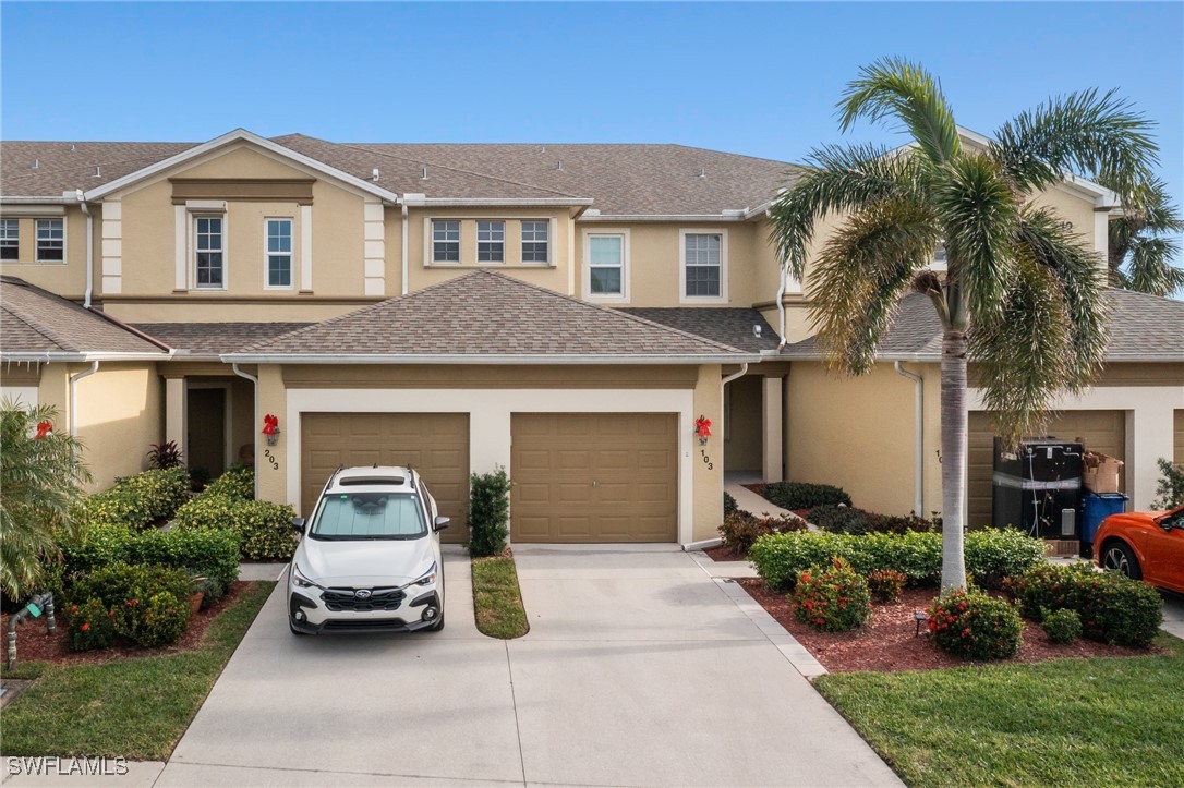 a car parked in front of a house