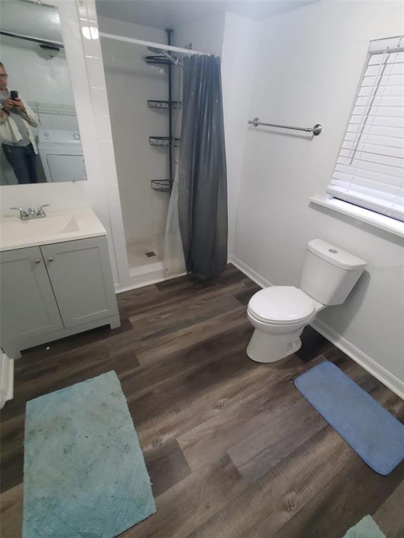 a bathroom with a sink toilet and a vanity