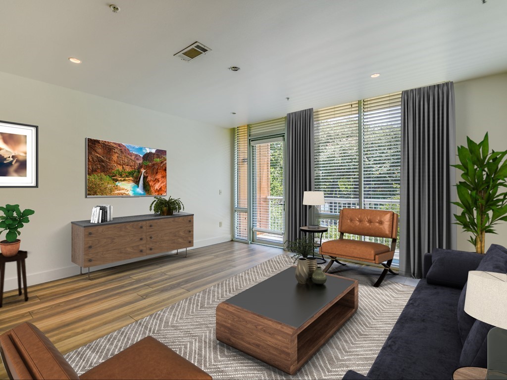 a living room with furniture and a flat screen tv