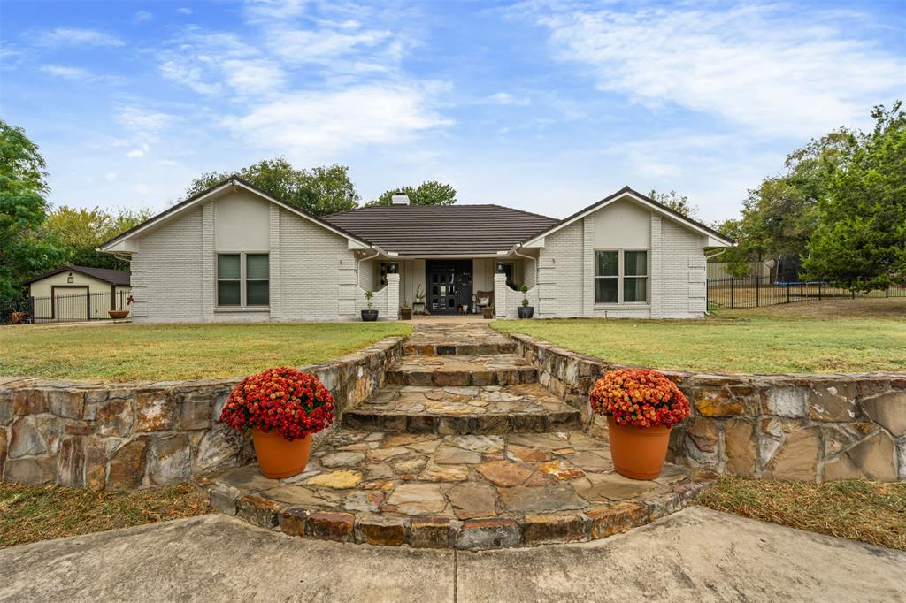 a view of a house with a patio