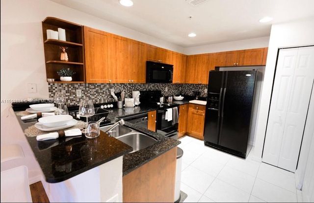 $520,000 | 10805 Northwest 89th Terrace, Unit 2024 | Doral