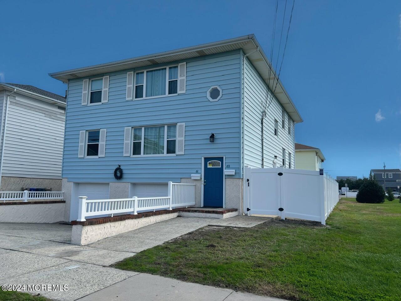 a front view of house with yard