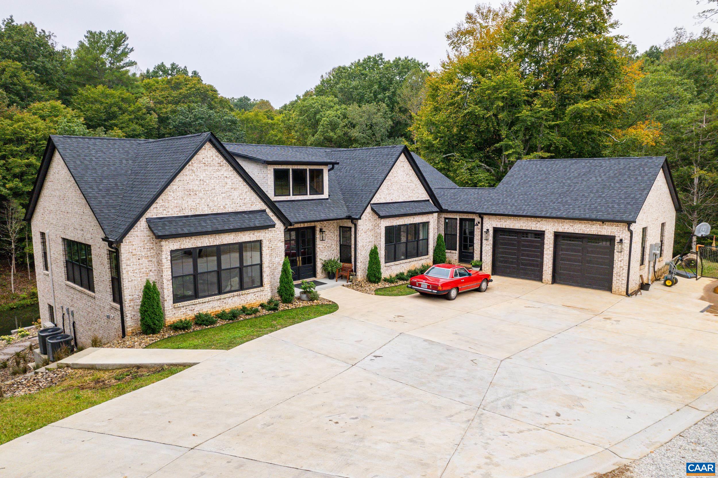 a front view of a house with yard