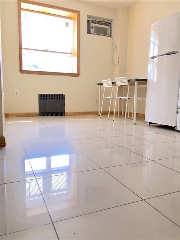 a view of kitchen with furniture and window