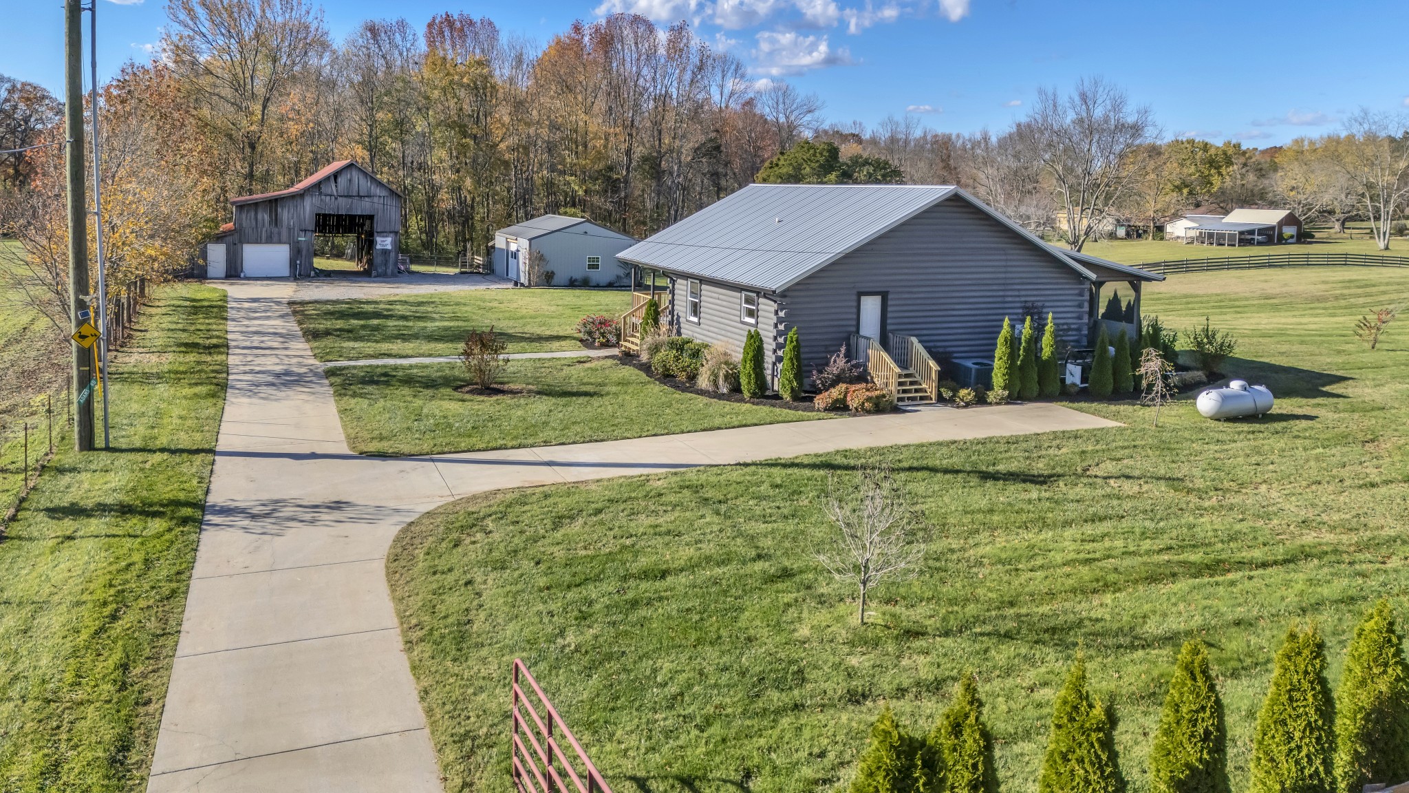 a front view of a house with yard