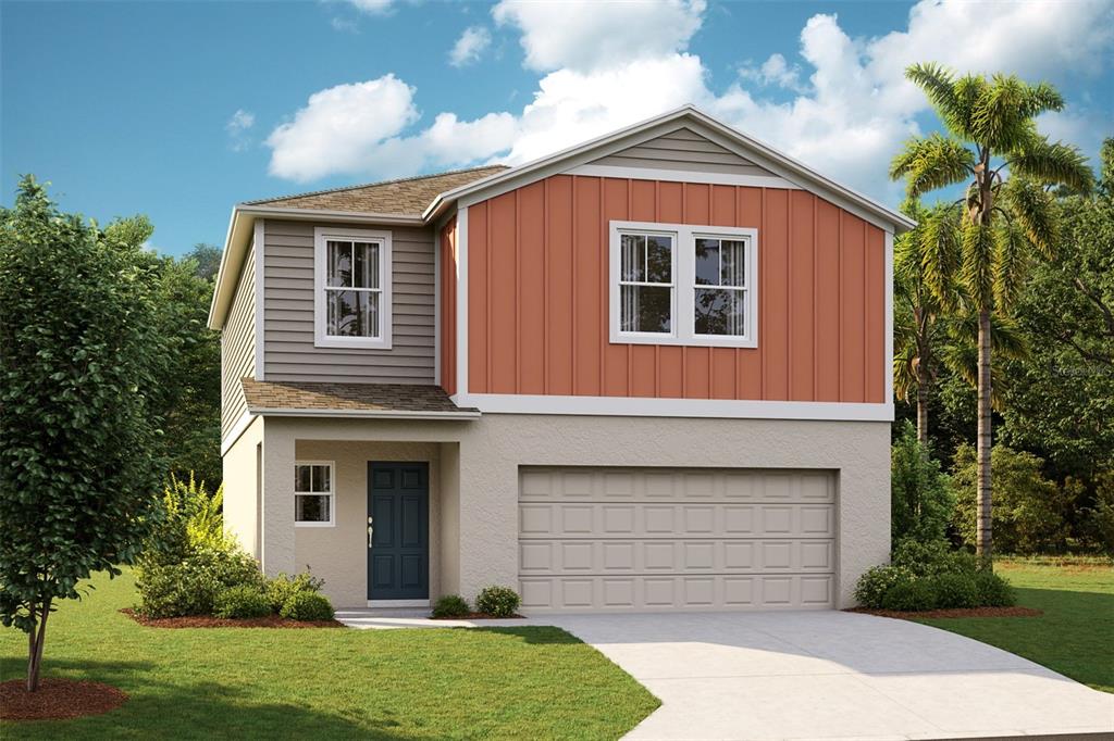 a front view of a house with a yard and garage