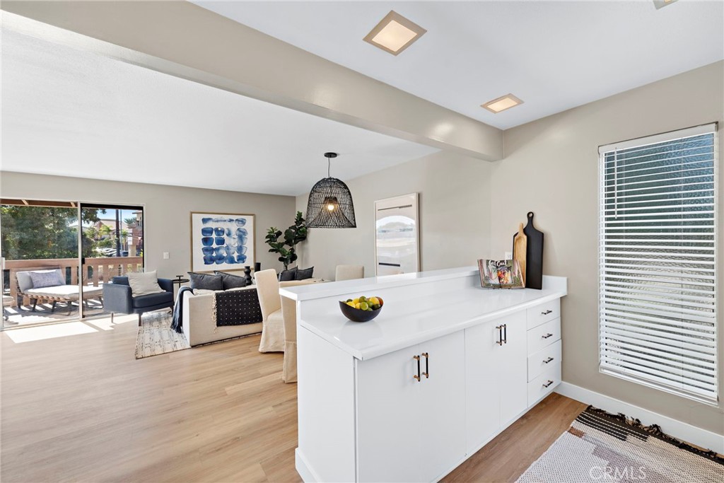 a view of living room with furniture and flat screen tv