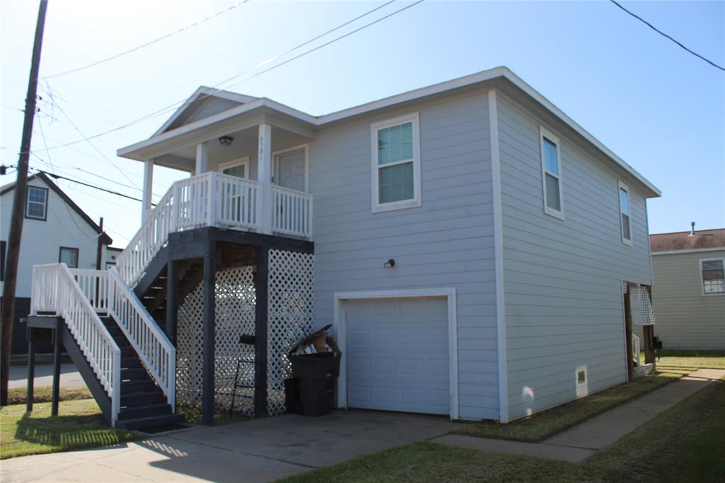 a front view of a house with garage