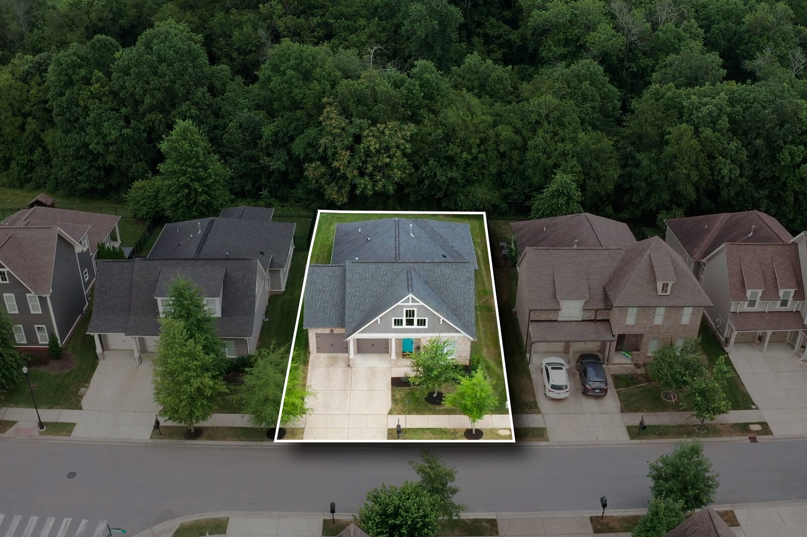 an aerial view of house with yard