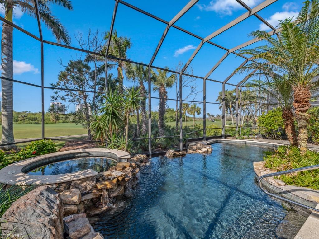 a view of a swimming pool with a patio