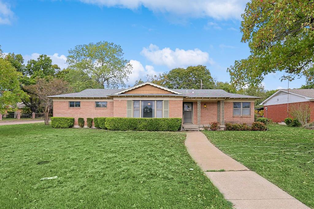 a view of a house with a big yard