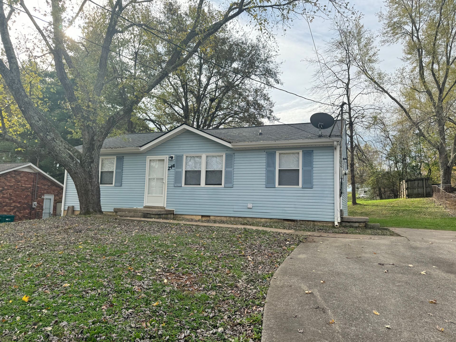 a view of a house with a yard