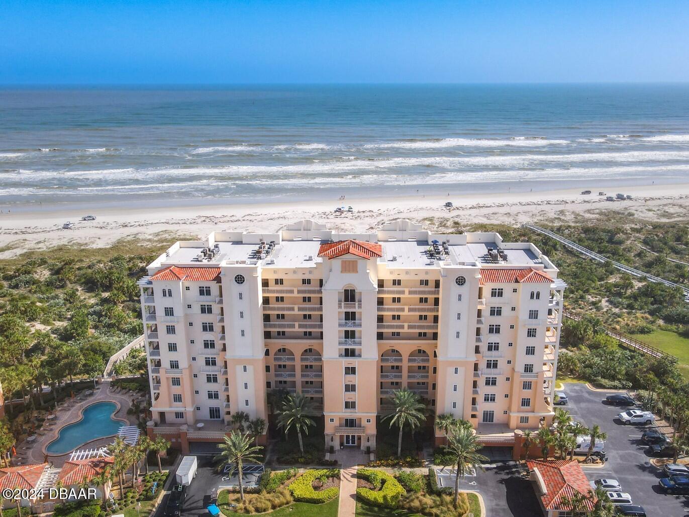 a view of a building with a ocean view