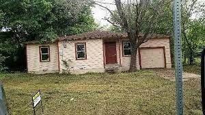 a house with trees in front of it