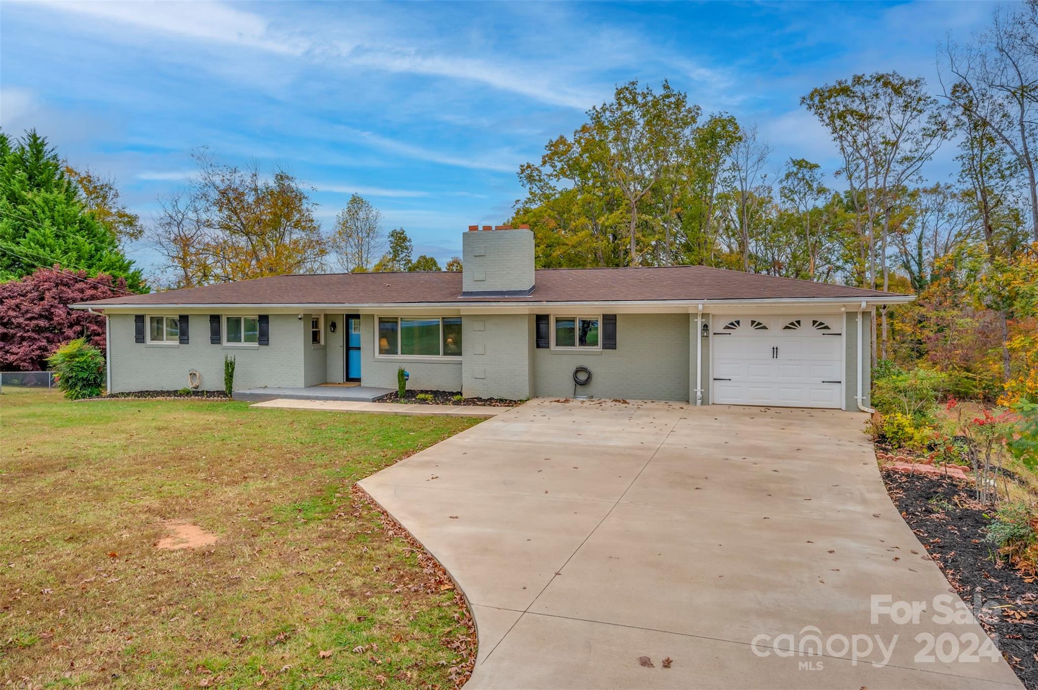 front view of a house with a yard