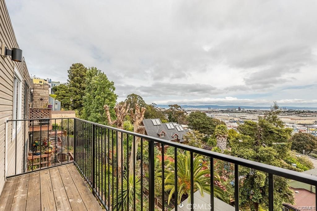 a view of a balcony with city view