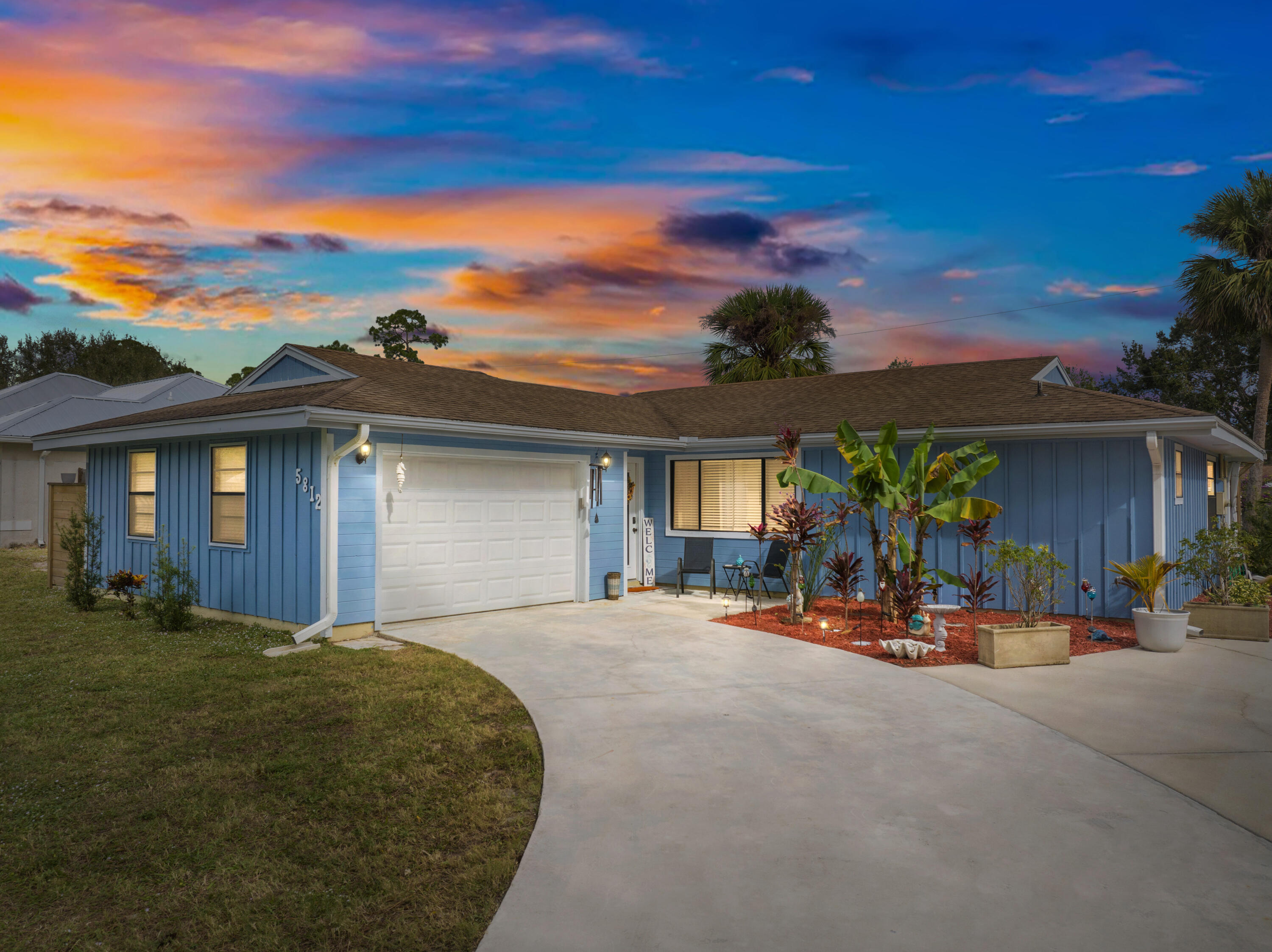 a view of a house with outdoor space and porch