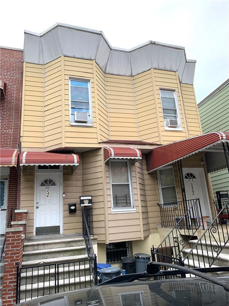 a view of a house with a balcony