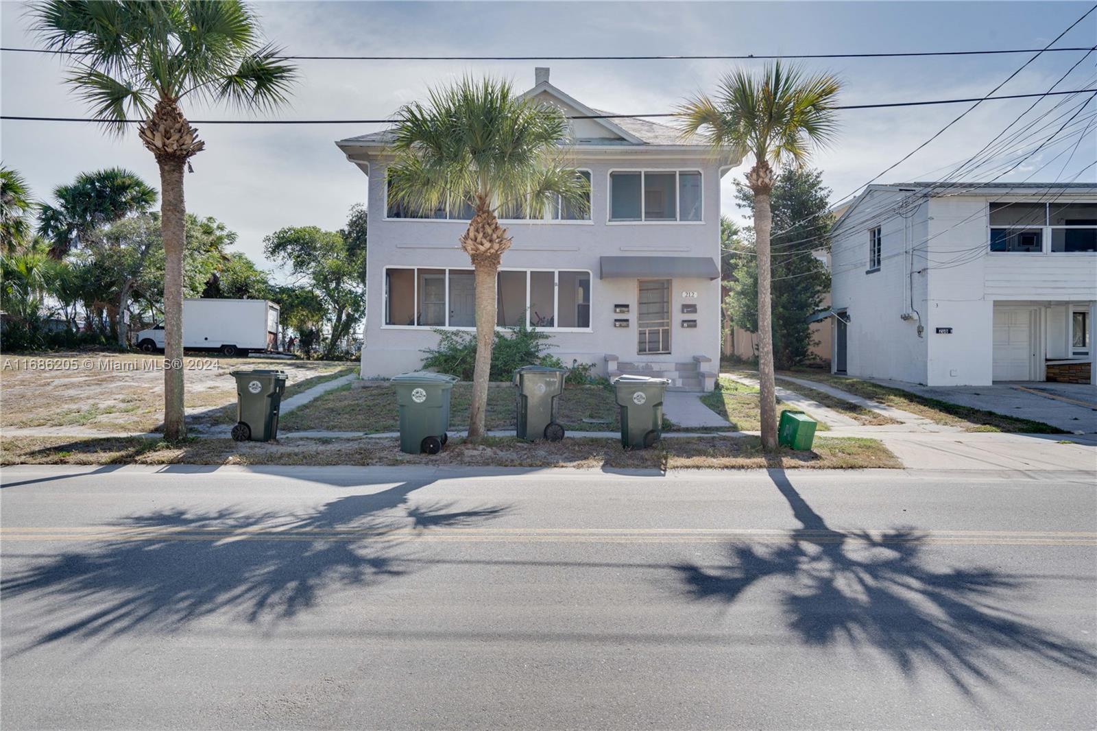 front view of a house with a street