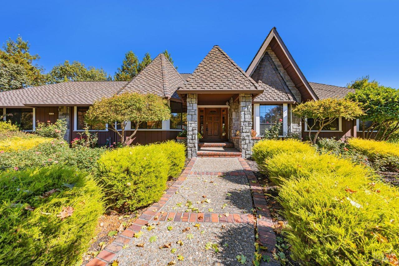 front view of a house with a yard