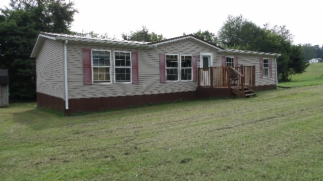 a view of a house with a garden