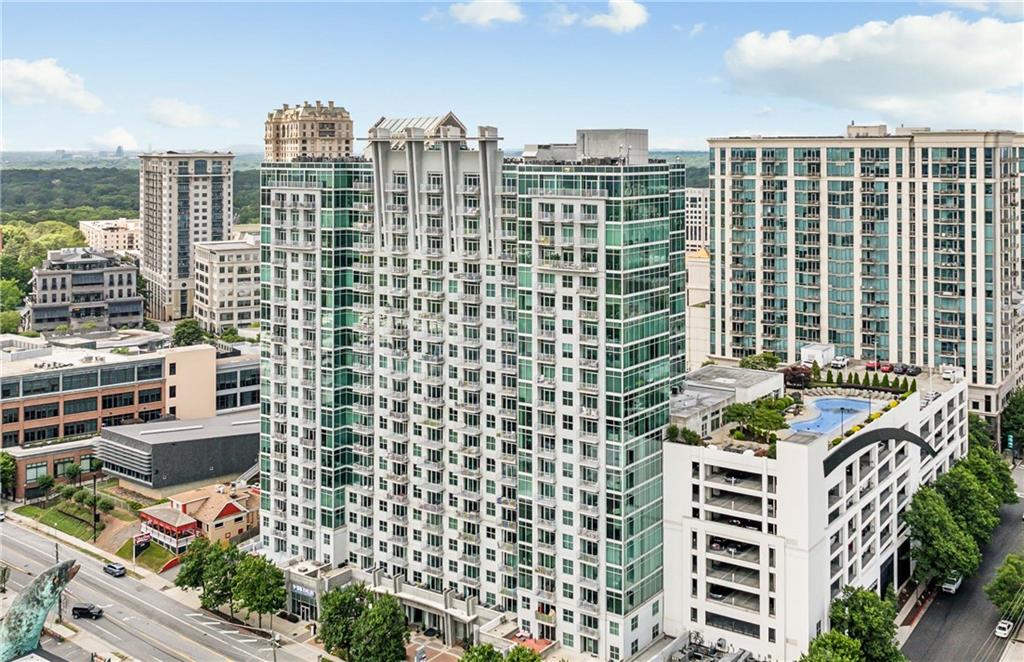 a view of a city with tall buildings