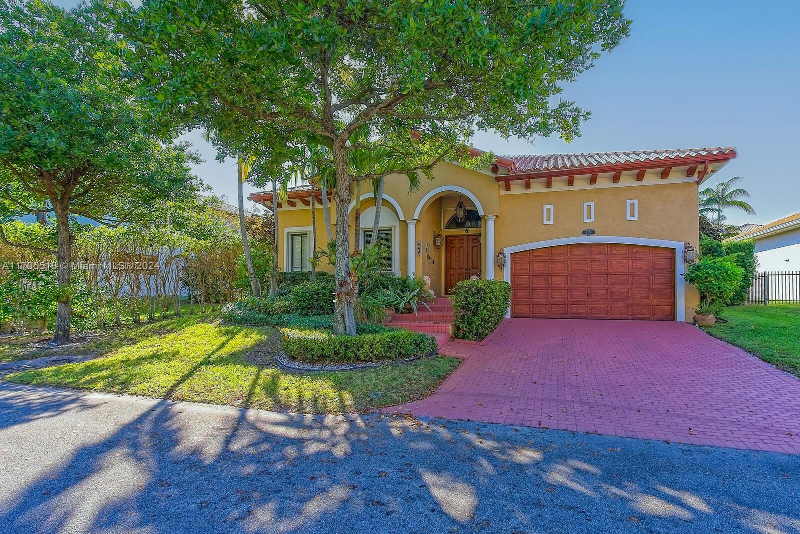 a view of front of house with a yard